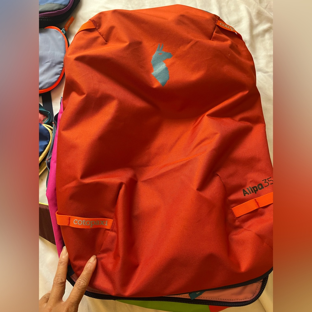 Cotopaxi Alpa 35L Travel Bag in Vibrant Orange